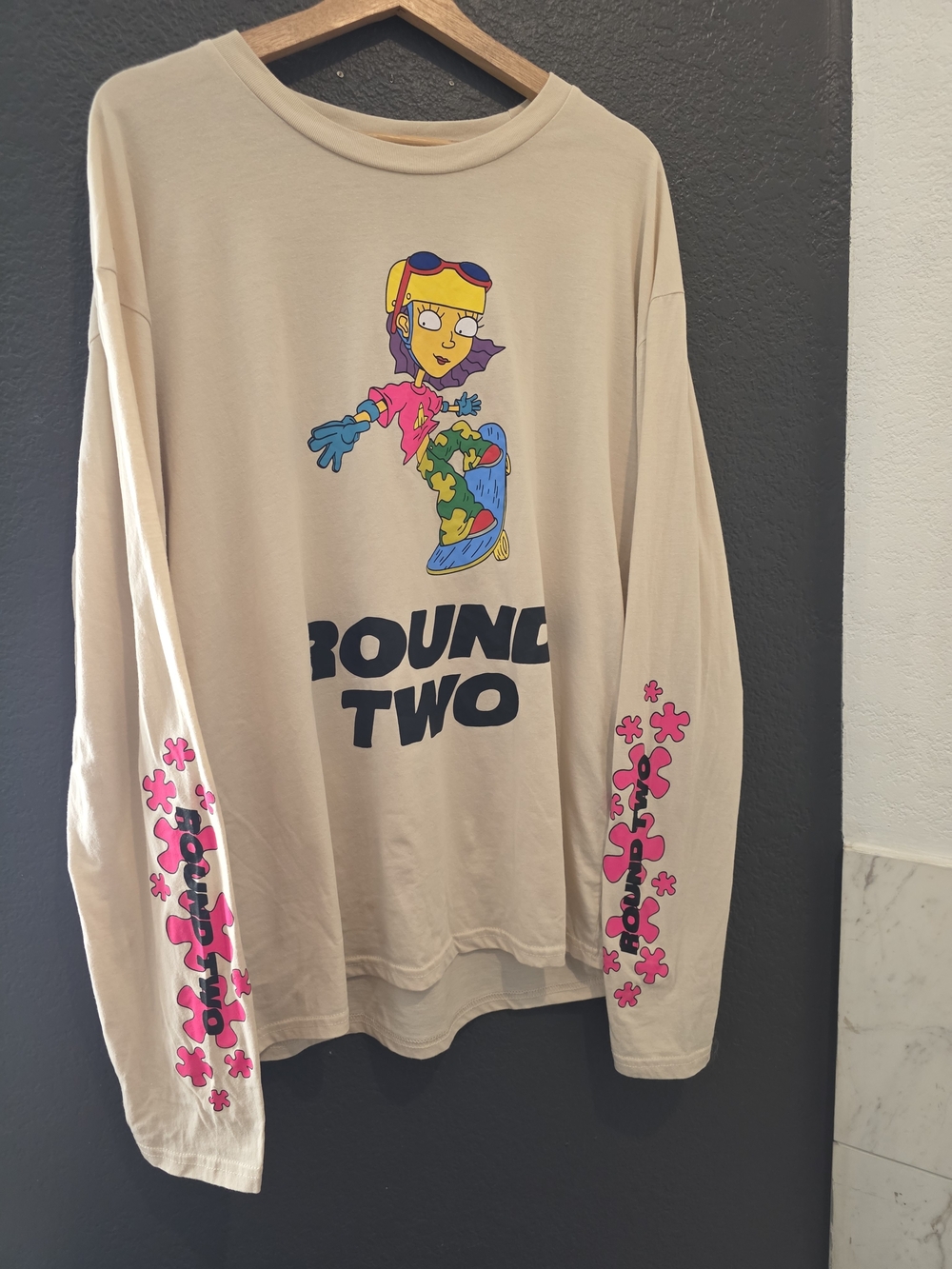 Urban OutfittersRocket Powe Graphic Long-Sleeve Tee with Pink Sleeve Flowers